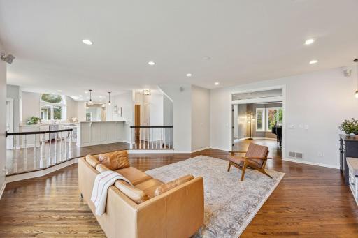 Family room is open to dining and kitchen areas.