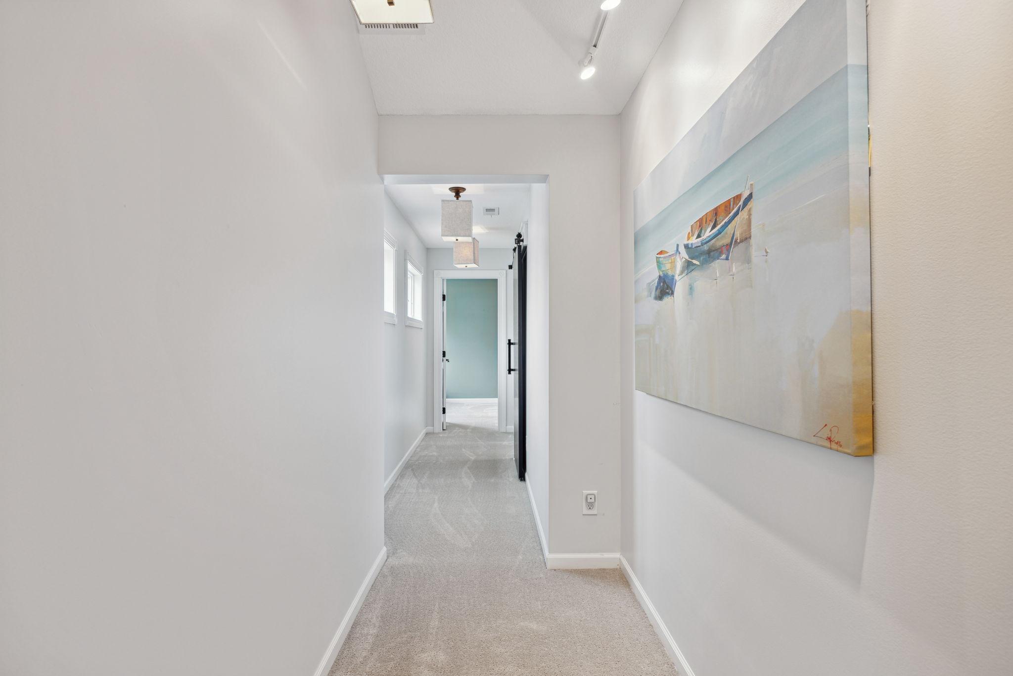 Hallway brings you to 4rth bedroom and laundry area.