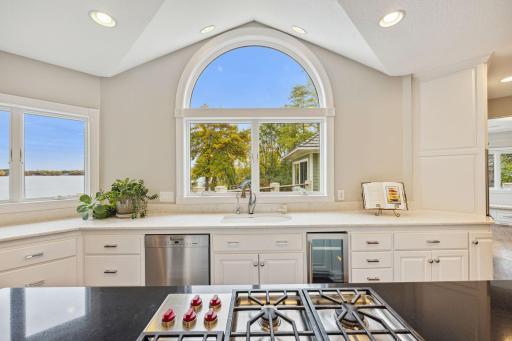 Chefs kitchen has plenty of counter space and cabinetry.