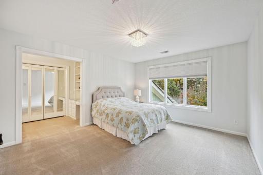 2nd bedroom has built in deck and shelving, plus a homework area.