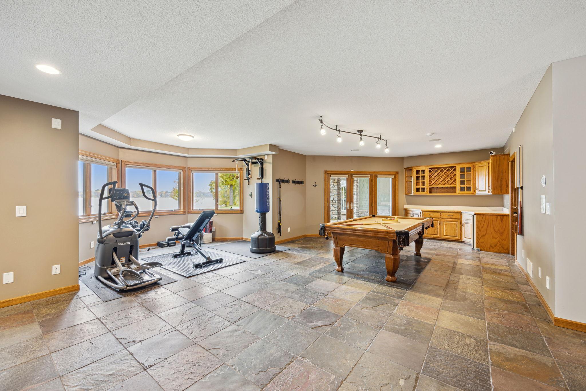 Open flow area with wet bar.