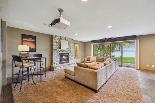 Lower level family room with Projector and screen.