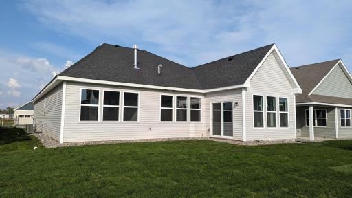 A four-season porch extends the main level living space while offering privacy to one side of the home with a future patio installation! Rear of the home faces southwest.