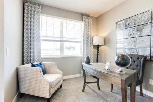 The home's flex room can be used as an office space, which is just one of several possible ways to utilize the space - including a play room for little ones, a formal dining room or just another place to relax!