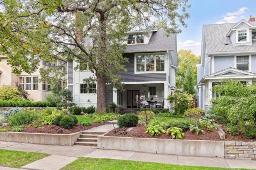 Sited on an elevated lot with beautifully landscaped gardens and front lawn Stone paver front walk. Surrounded by lovely historic homes.