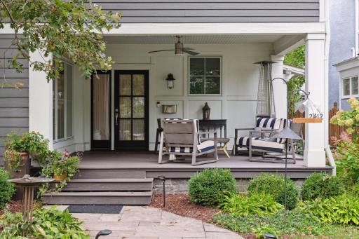 Stone paver walk and low-maintenance decking on the front porch. Plenty of space for an intimate outdoor gathering.
