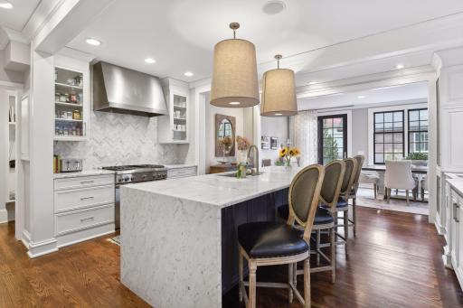 Gorgeous designer finishes and mill work. Plentiful natural light through large windows along two sides of the kitchen.