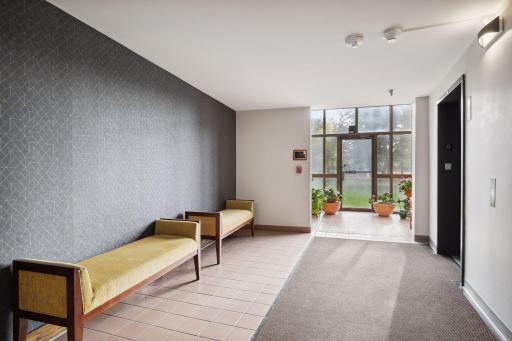 Lower level sitting area outside of the two newer elevators