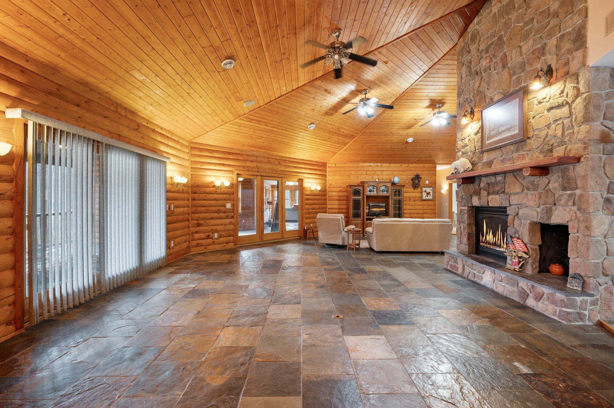 18+ Acres on the Rum River. One Level Living with Geo Thermal heated floors throughout.