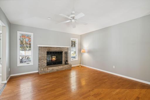Living Room w Hardwood Floors & Wood Burning FP