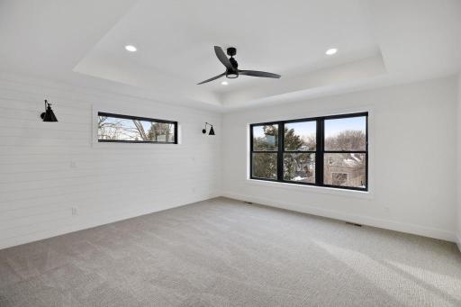 Large Owner's Suite offers spa-like bath and walk-in closet. Pictures of previously built house.