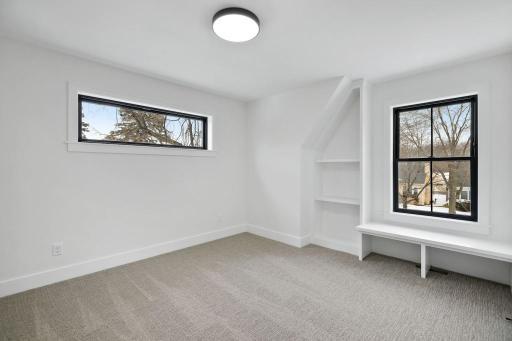 2 additional bedrooms and loft feature custom bookshelves and benches. Pictures of previously built house.