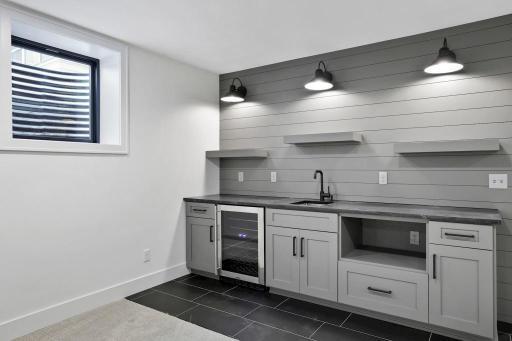 Lower level bar. Pictures of previously built house.