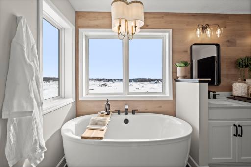 Relax in the spa like, freestanding soaking tub.