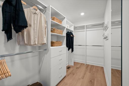 Owner's closet with built in components.