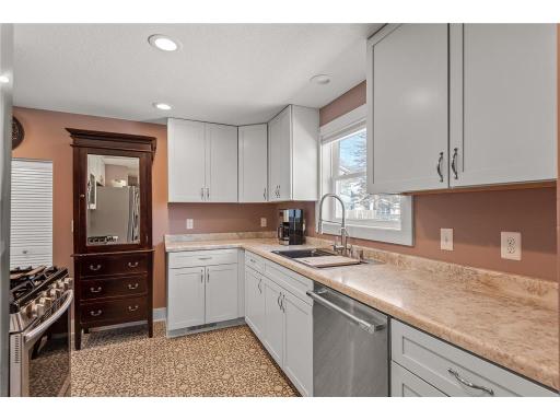 Tons of unique storage and prep space as well as a kitchen window allowing you to enjoy nature in the comfort of your home.