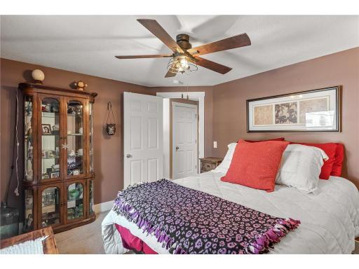 The first of three main level bedrooms. This bedroom offers new plush carpet, tons of natural sunlight and a ceiling fan for additional comfort.