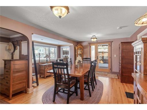 Spacious, light and bright dining room with large windows allow for an abundance of sunlight to stream through.