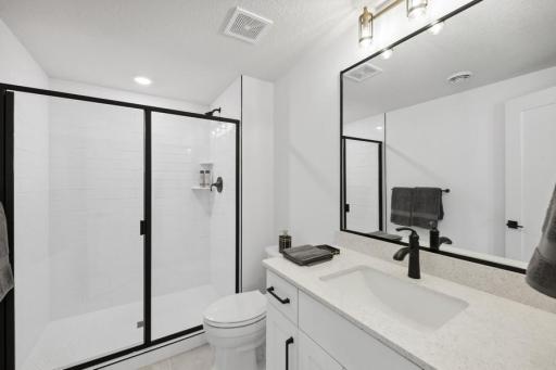 This additional lower level bath is an ensuite off of the bedroom for privacy!