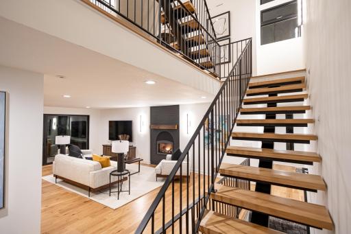 Up the stairs is the kitchen, dining room and hearth room.