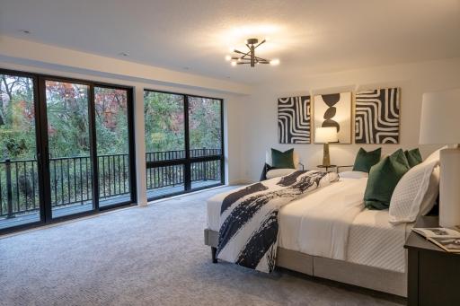 Bedroom #3 is huge, has a private deck, a walk-in closet and has a full bath right outside the door.
