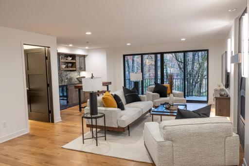 Notice the gorgeous view and sliders to the outdoors.