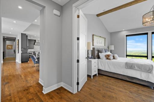Primary bedroom off of the main level living room