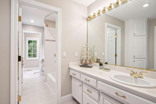Jack & Jill bathroom. Each bedroom enjoys their own, private vanity. Well lit, great storage and each has a walk-in closet.