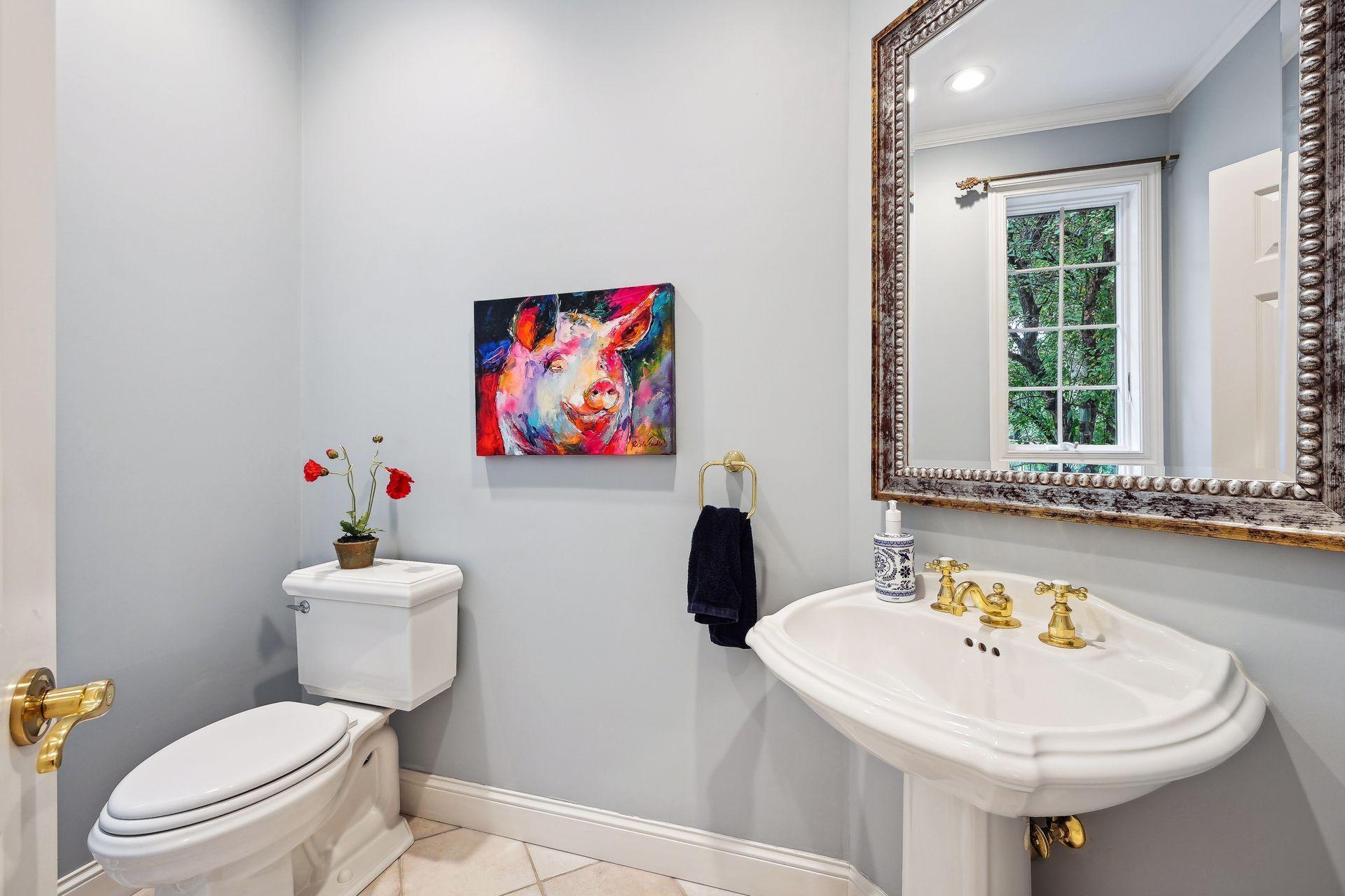 Half bathroom on main floor as you enter from the garage. Easily accessible, yet private, for guest use.