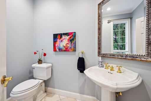 Half bathroom on main floor as you enter from the garage. Easily accessible, yet private, for guest use.