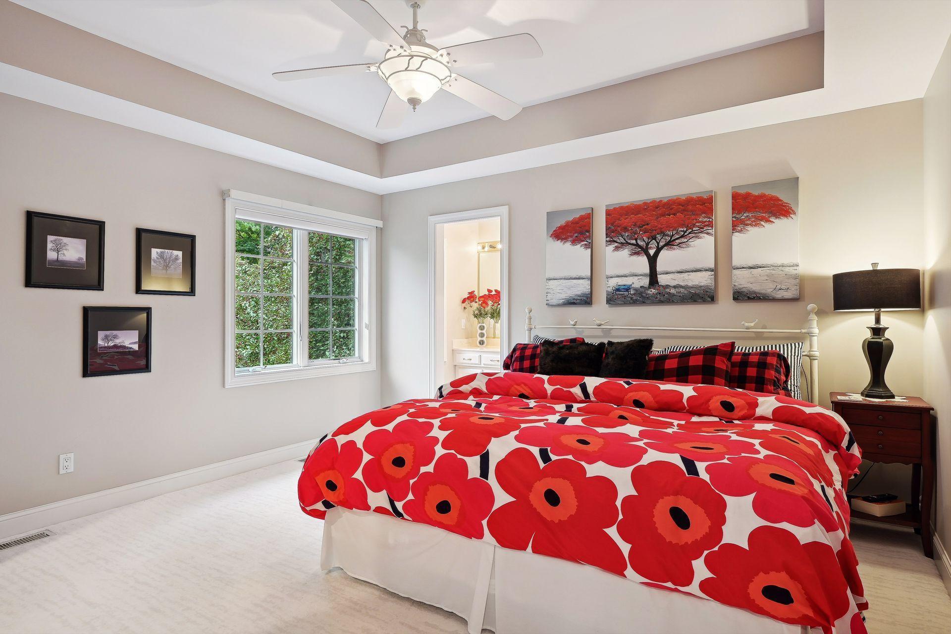 Bedroom #3 on Upper-Level. Charming accommodations with views of the lake. Every bedroom in this home feels pleasantly spacious.