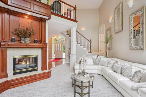 Custom millwork, sweeping staircases and multiple fireplaces elevate the comfort & appeal of this prestigious home.