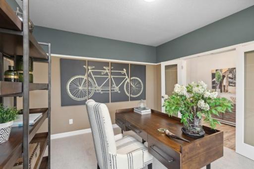 The main level study provides a perfect setting for those working from home, paying bills or completing a school project. (Photo of decorated model, actual home's finishes may vary slightly)