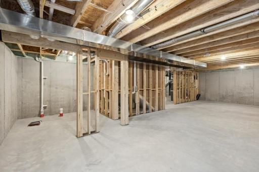 Need additional space to expand? This unfinished lower level is perfect. (Photo of decorated model, actual home's finishes may vary slightly)