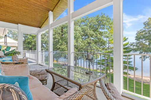 The 3 season screened in porch is the perfect place for a cup of coffee on warm summer mornings