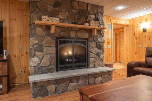 Gas burning fireplace in the family room.