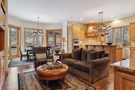 The cozy family room, kitchen in and eat-in dining area make for easy living.