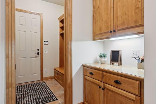 There is a mudroom and dedicated closet or pantry at the garage entrance.