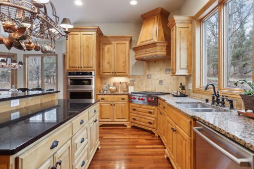 You'll enjoy the stainless steel appliances and 19.	Venice Fiorito granite countertops.
