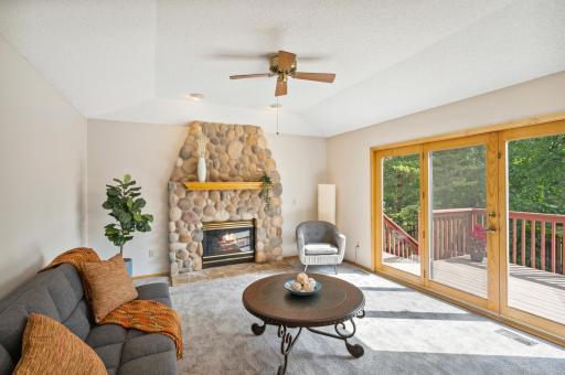 Living Room that leads to your low-maintenance Deck and Backyard!