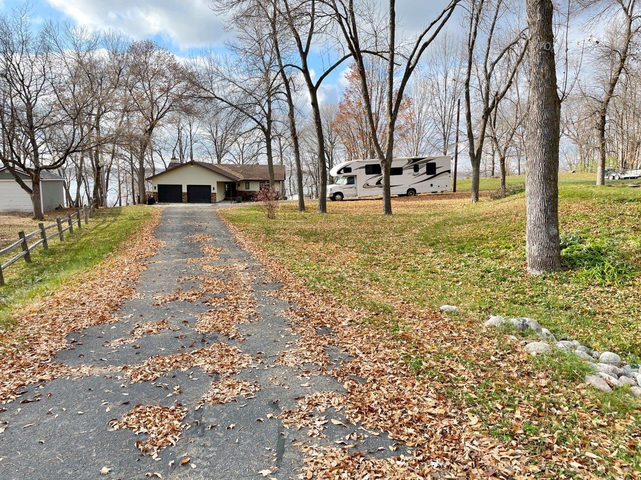 Tar driveway and large yard