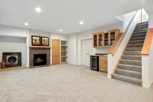 Family room w/built-ins, gas fireplace, & wet bar.