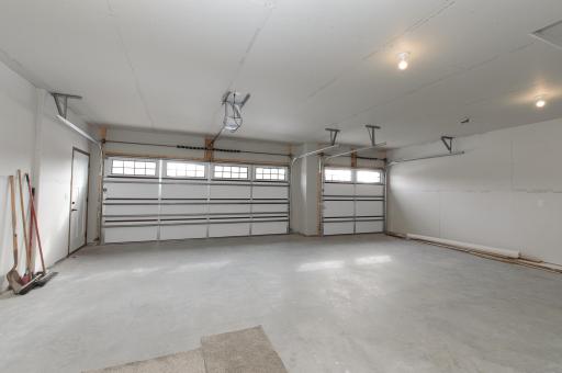Insulated and sheetrock triple garage.jpg