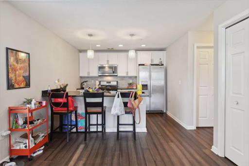 Kitchen with breakfast bar, stainless appliances