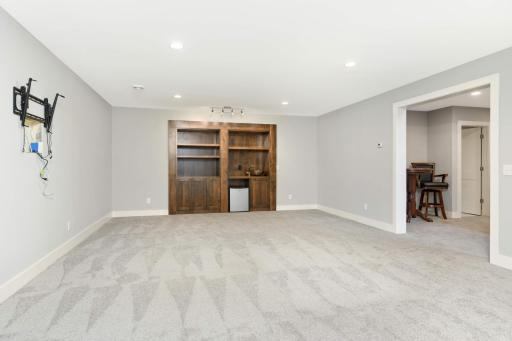 Lower Level Wet Bar with Hidden Flex Space