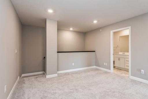 The spacious second floor loft offers great space for a workstation, TV, gaming, or playroom. *Photos are of another home, colors and finishes may vary.