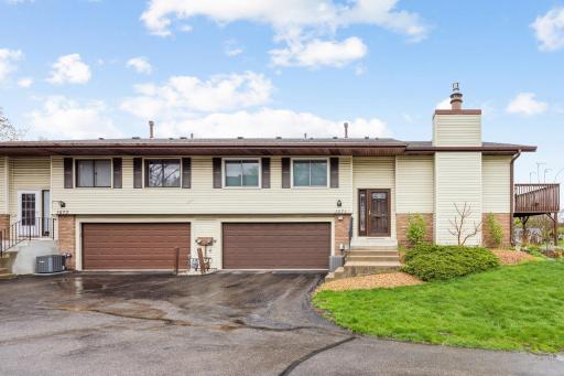 Welcome to this 2 bedroom 2 bathroom end unit townhome in Shoreview!