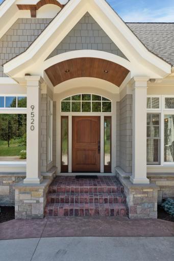 Front door entry with a lovely wooden barrel vault.