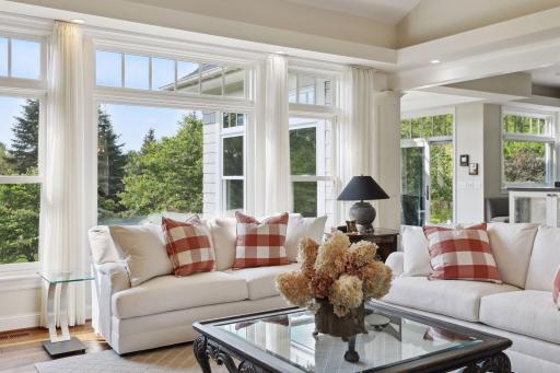 Wonderful views out these windows of the water feature and lovely landscaping.
