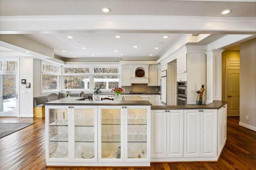 The kitchen was updated a few years ago with quartzite on the center island and Silestone on the perimeter.